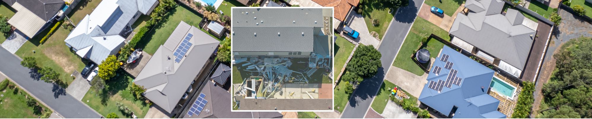 Aerial view of cyclone damage to residential properties