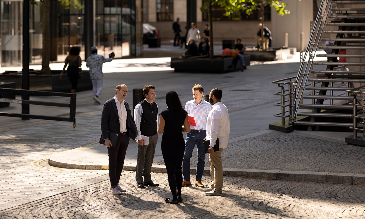 Lloyd's colleagues outside the Lloyd's building