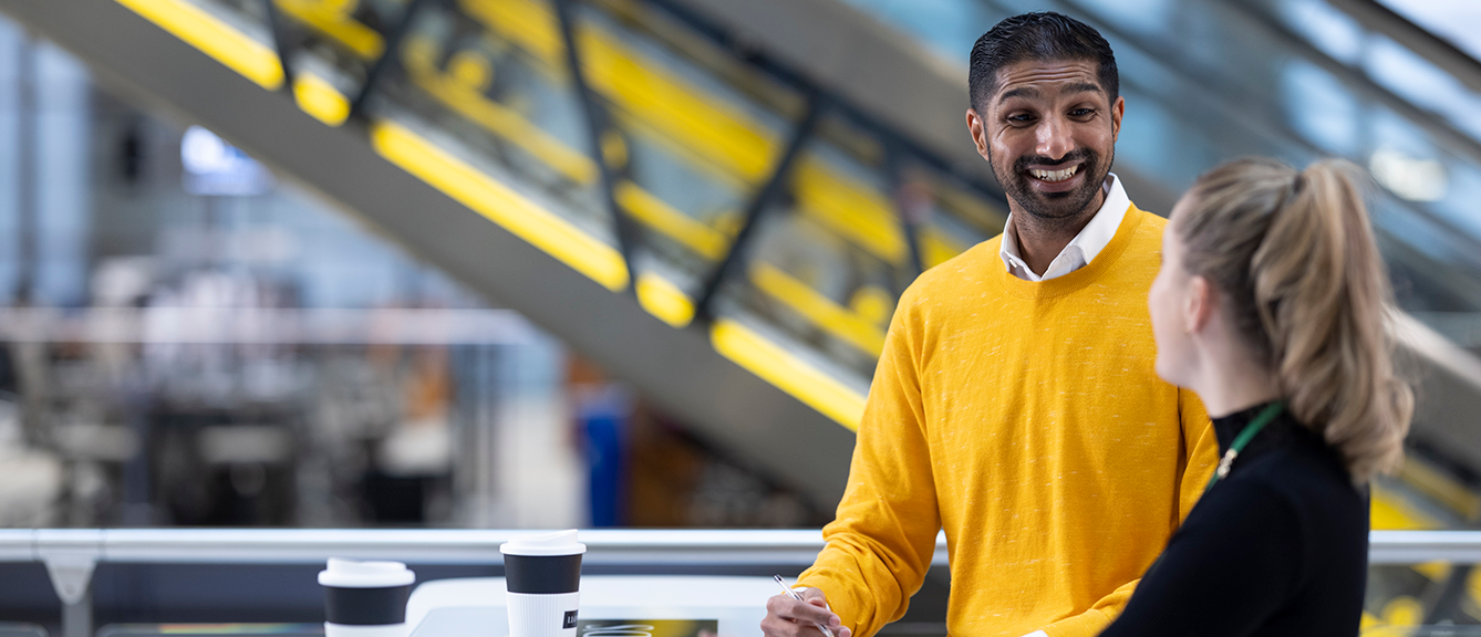 Lloyd's colleagues inside the Lloyd's building
